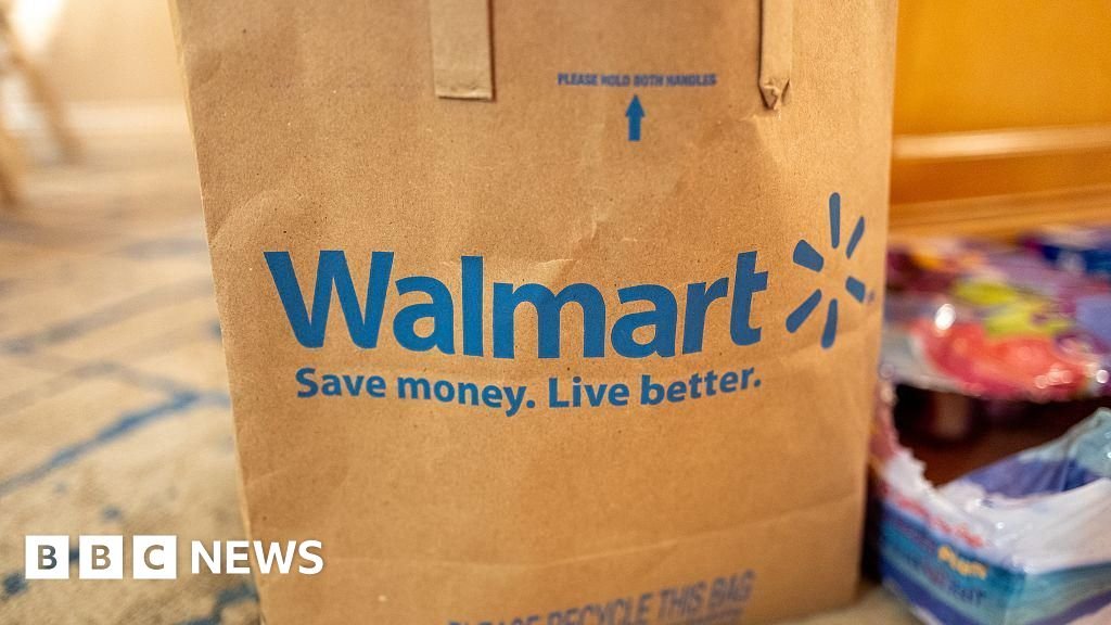 Walmart to pay $100m over claims it misled drivers over pay